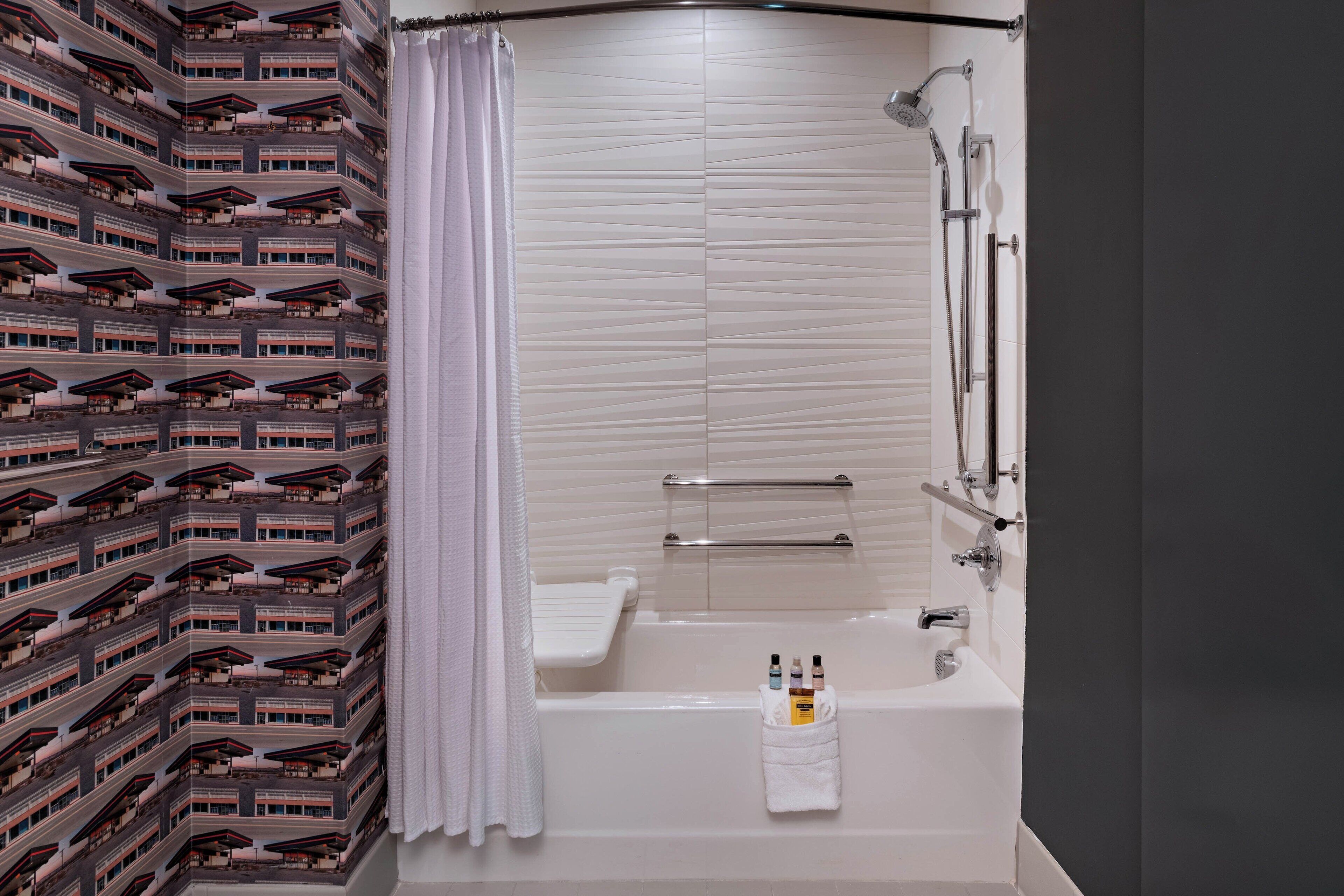 shower, designer toiletries, hair dryer, towels