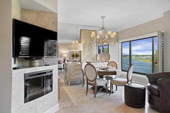 Smart TV, fireplace, books, offices