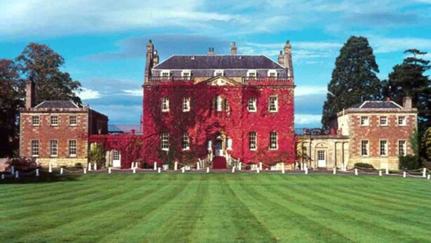 A large, historic building with a symmetrical facade, large windows, and a central entrance. - Immaculate Cabin 5 Mins to Inverness Dog Friendly (Inverness)