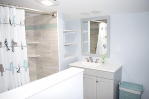 Combined shower/bathtub - Willow's Bungalow-Renovated In-Town Cottage. Perfect Location. (Chincoteague)