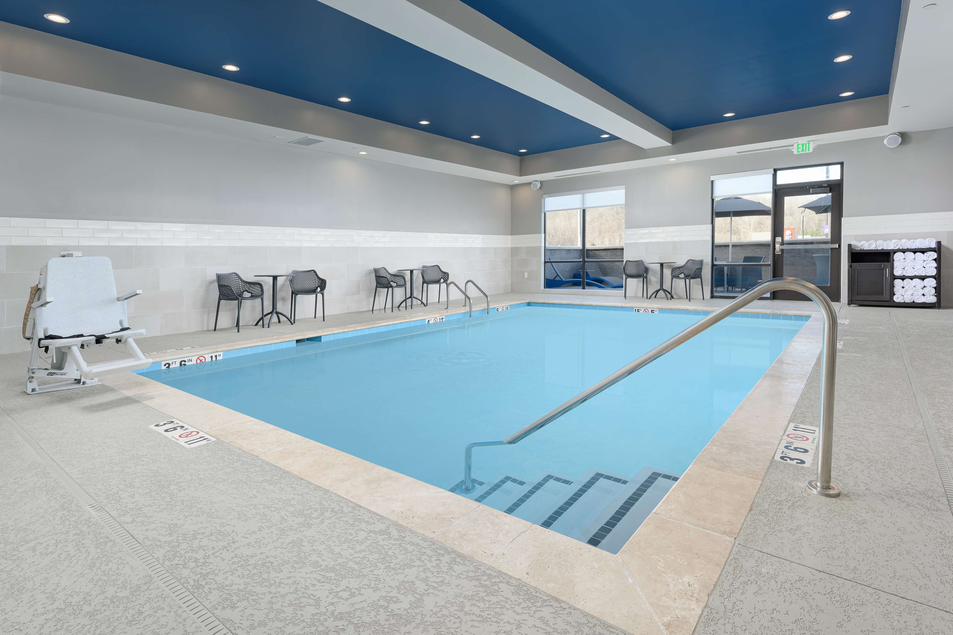 indoor pool, open 9:00 am to 10:00 pm, pool loungers