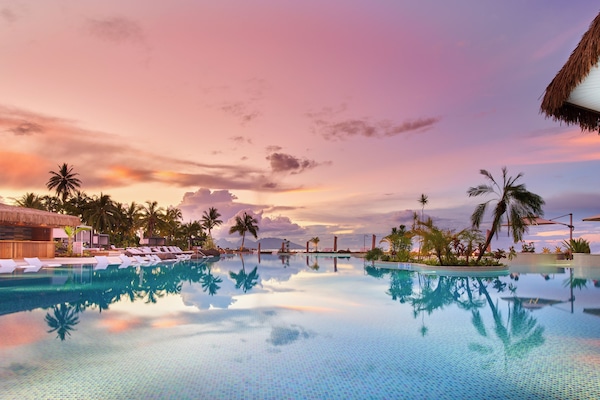 Outdoor pool, open 7:00 AM to 7:00 PM, cabanas (surcharge)