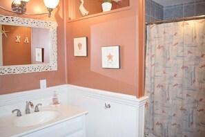 Combined shower/bathtub - Agape House | In-Town Chincoteague Home w/ Walk to Shops, Outdoor Shower & Family-Friendly Layout (Chincoteague)