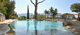 amazing house with a panoramic view in front of the sea and lagoon swiming pool