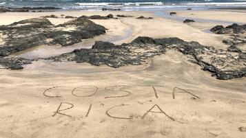 On the beach, beach towels