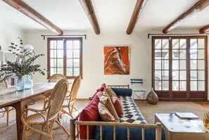 TV, fireplace, books, offices