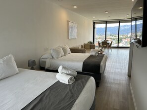Apartament prèmium, 2 llits de matrimoni | Roba de llit d'alta qualitat i cobrellits 