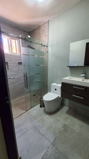 Shower, hair dryer, towels, soap