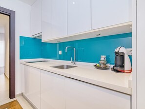 Fridge, microwave, coffee/tea maker, toaster