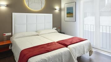 1 slaapkamer, een strijkplank/strijkijzer, internet, beddengoed