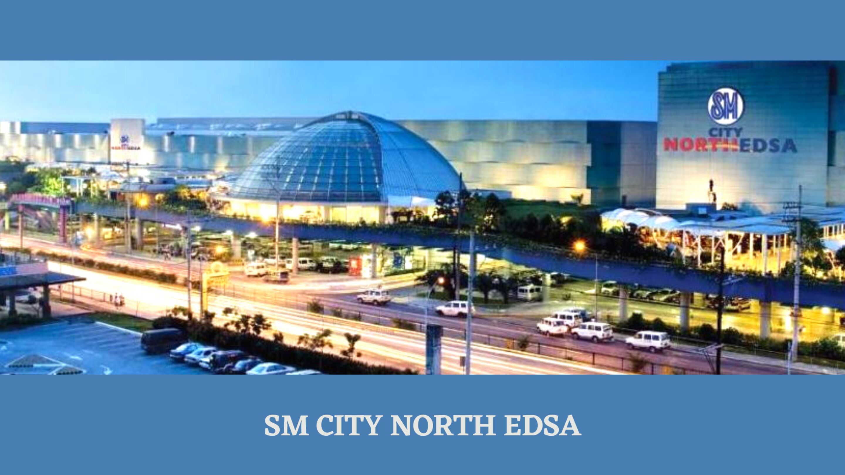 Un edificio moderno con una cúpula y un letrero que dice "SM CITY NORTH EDSA".