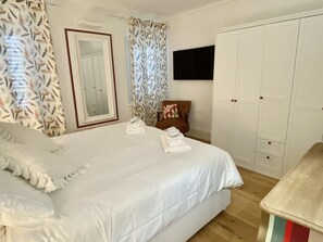 2 bedrooms, in-room safe, iron/ironing board, travel cot