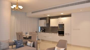 Deluxe Two Bedroom Apartment | Private kitchenette | Full-size fridge, microwave, oven, stovetop