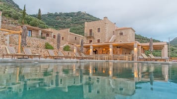 Seasonal outdoor pool, open 9:00 AM to 9:00 PM, sun loungers