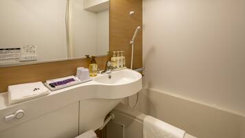 Combined shower/tub, deep soaking tub, free toiletries, hair dryer