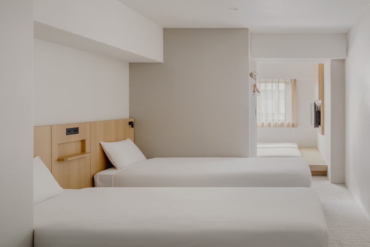 Chambre Familiale, non-fumeurs | Rideaux occultants, chambres insonorisées, Wi-Fi gratuit, draps fournis