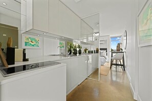 Fridge, microwave, stovetop, coffee/tea maker
