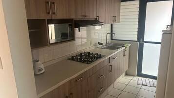 Fridge, microwave, oven, stovetop