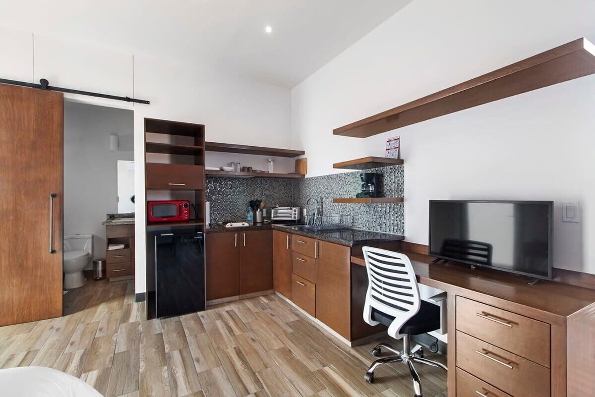 Fridge, microwave, stovetop, coffee/tea maker