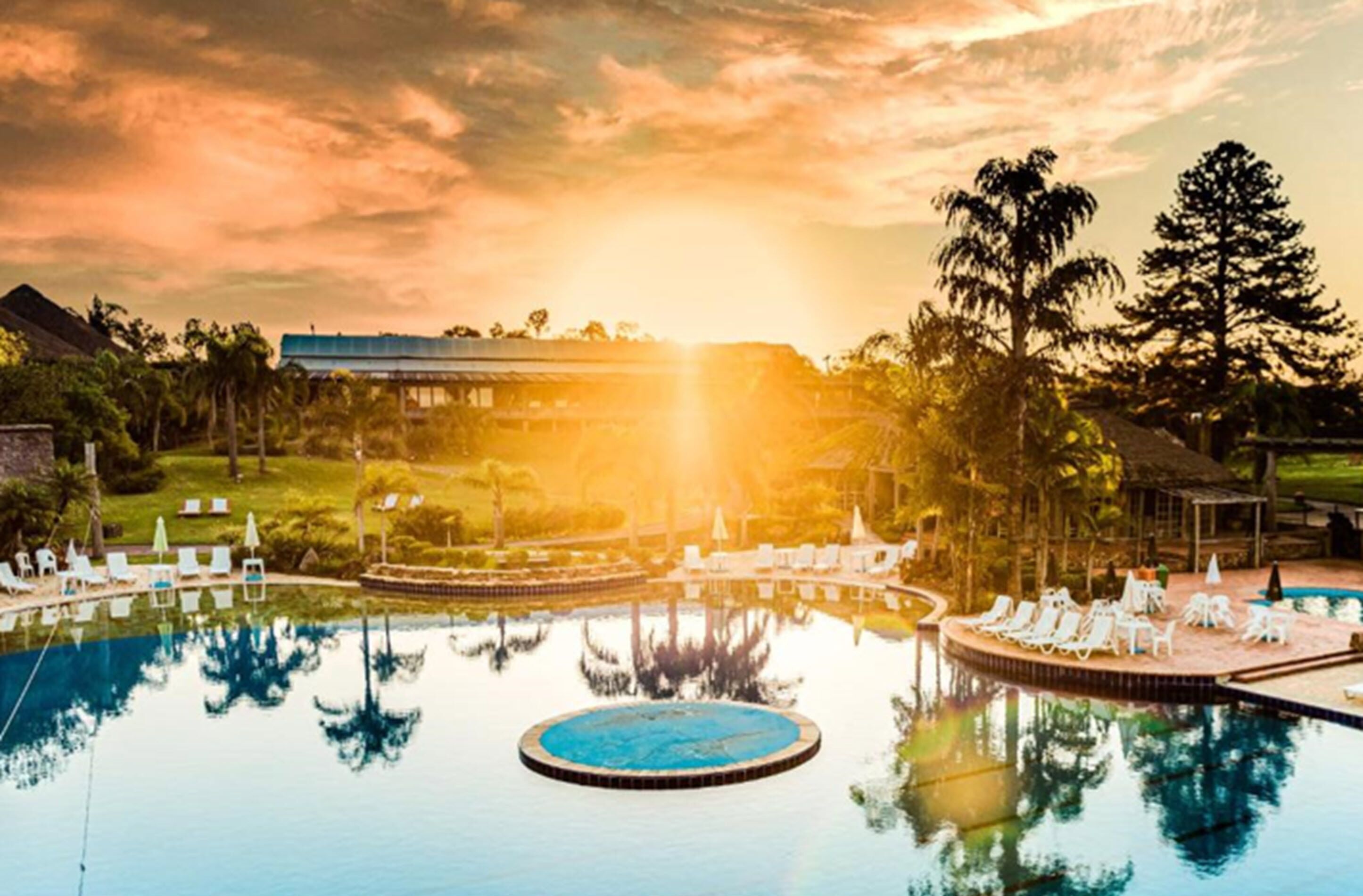 indoor pool, outdoor pool, pool umbrellas, pool loungers