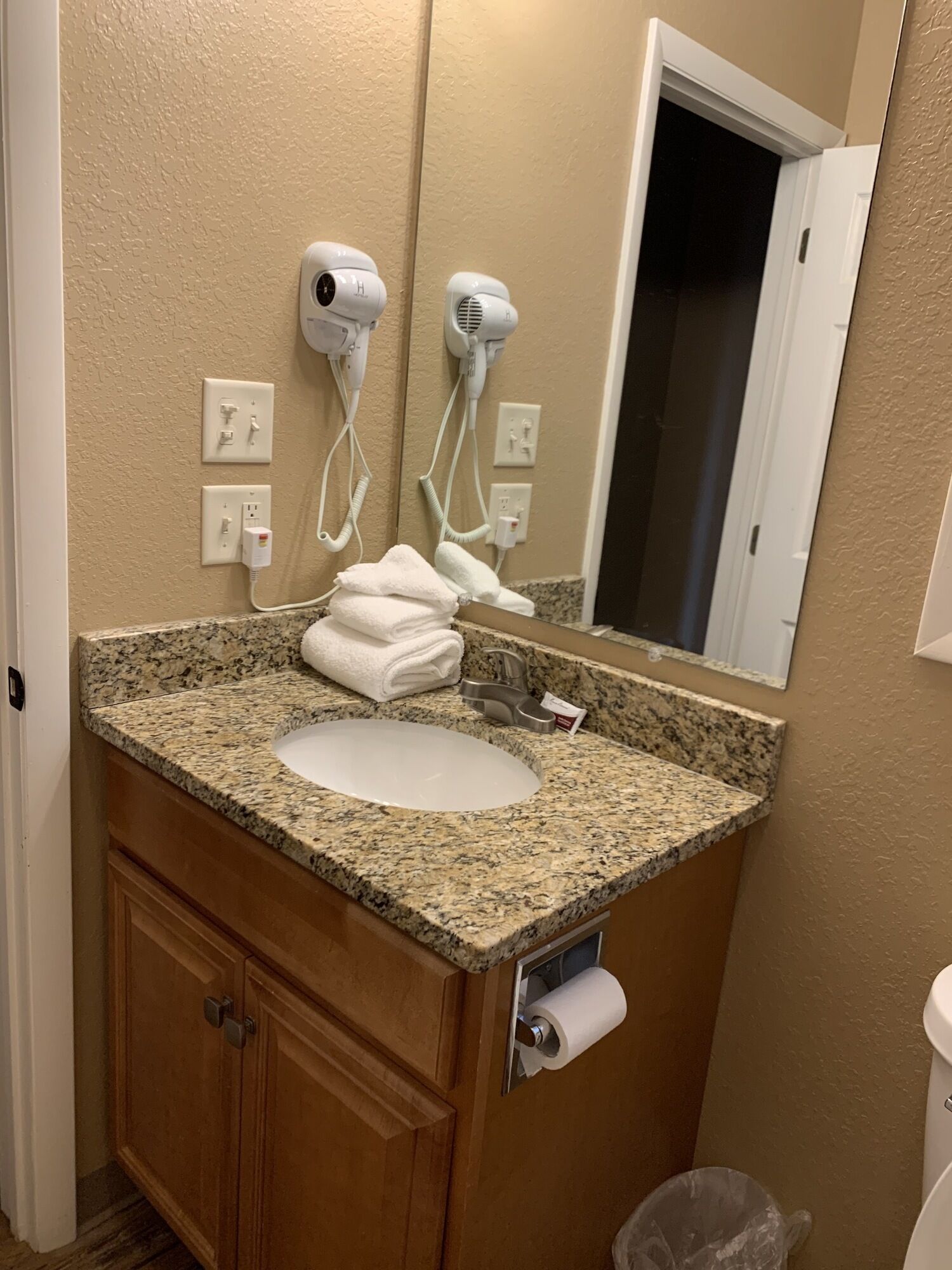 Bathtub, hair dryer, towels