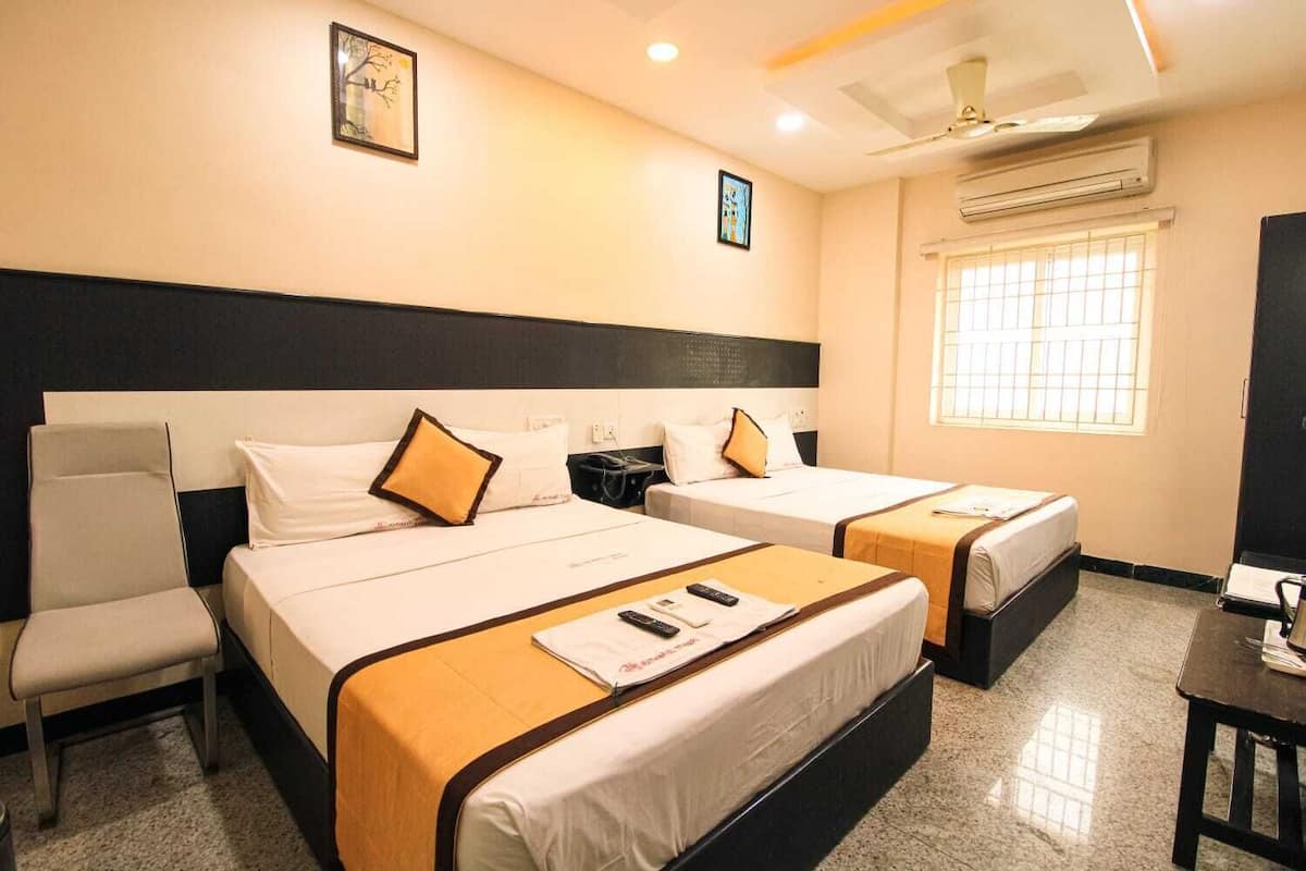Deluxe Room | Hypo-allergenic bedding, down duvets, blackout curtains