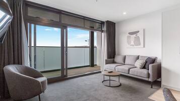 Deluxe Apartment, 1 Bedroom, Kitchen (Top Floor, Non-Motorway Facing) | Living area