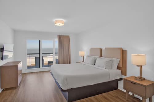 Premium bedding, down comforters, memory foam beds, in-room safe