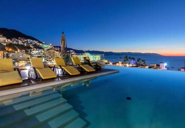 Outdoor pool, a heated pool - Nayri Life & Spa 410 Beautiful apt in the heart of the romantic area. (Puerto Vallarta)