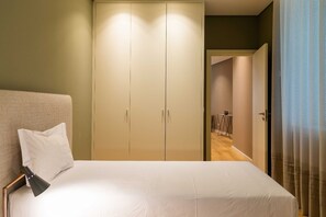 1 غرفة نوم ومكواة/لوح كي وخدمة الإنترنت وملاءات أسرّة