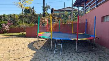 Enjoy bouncing fun in our outdoor trampoline area with a safety net for added security.