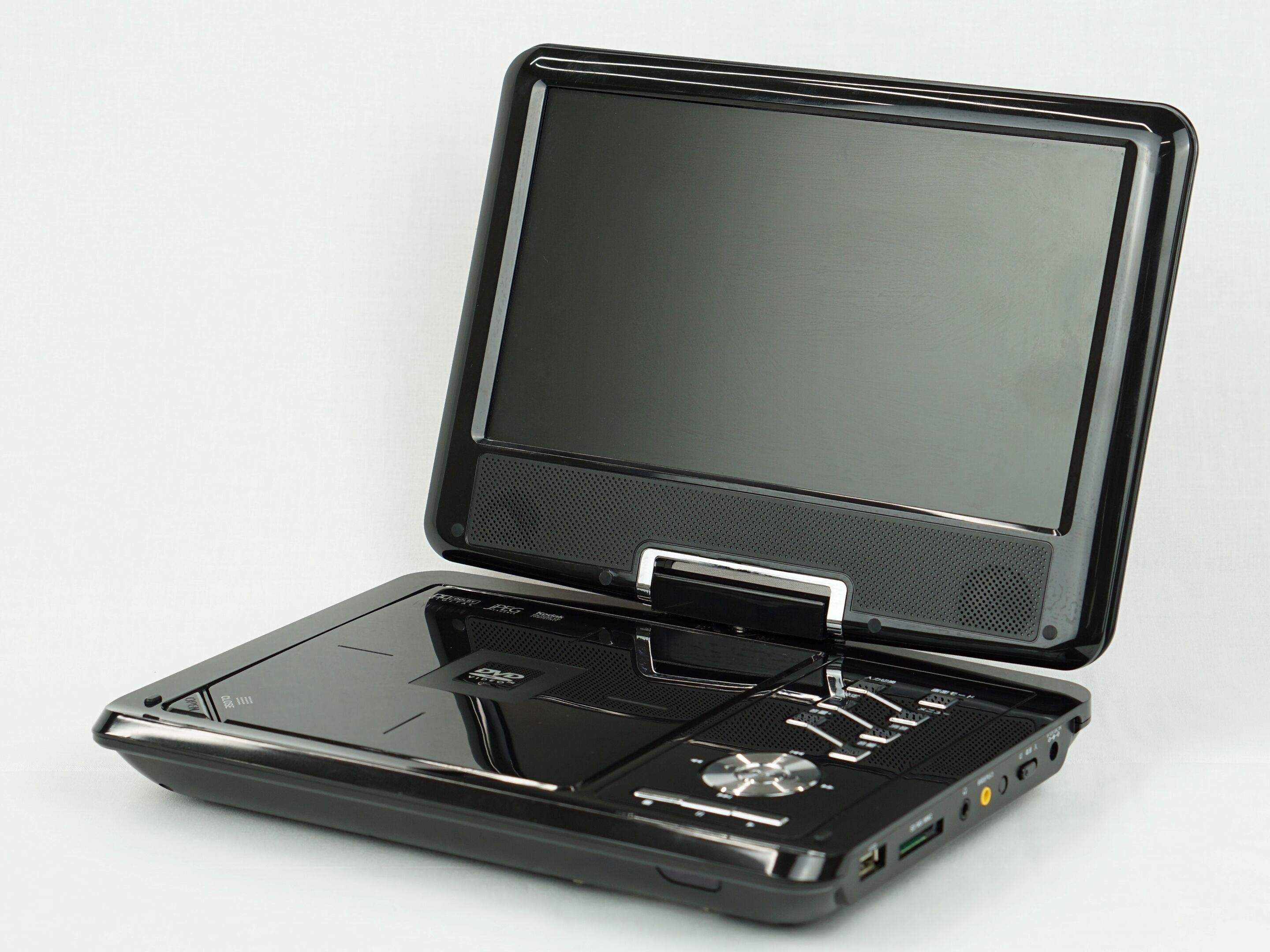 A portable electronic device with a screen, speakers, and various ports.