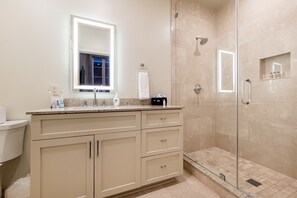 Combined shower/tub, hair dryer, towels, soap