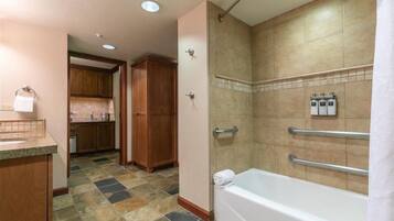 Combined shower/tub, hair dryer, towels, soap