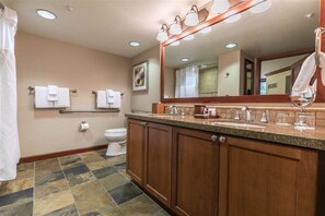 Combined shower/bathtub, hair dryer, towels, soap - Palisades Tahoe- Resort at Squaw Creek 2 Bd/2 bth Fireplace Suite. (Olympic Valley)
