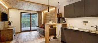 Appartamento di vacanza "Archehof Hochzirm Lodge Anna" con vista sulle montagne e sauna