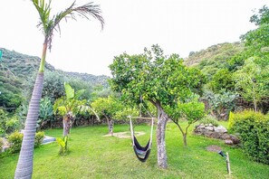 Property grounds - Villa Circe: A characteristic and welcoming cottage situated at a short distance from the suggestive Alcantara Gorges, with Free WI-FI. (Motta Camastra)