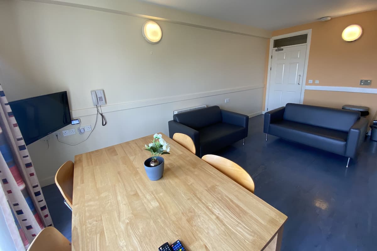 Classic Apartment | Living area | Flat-screen TV