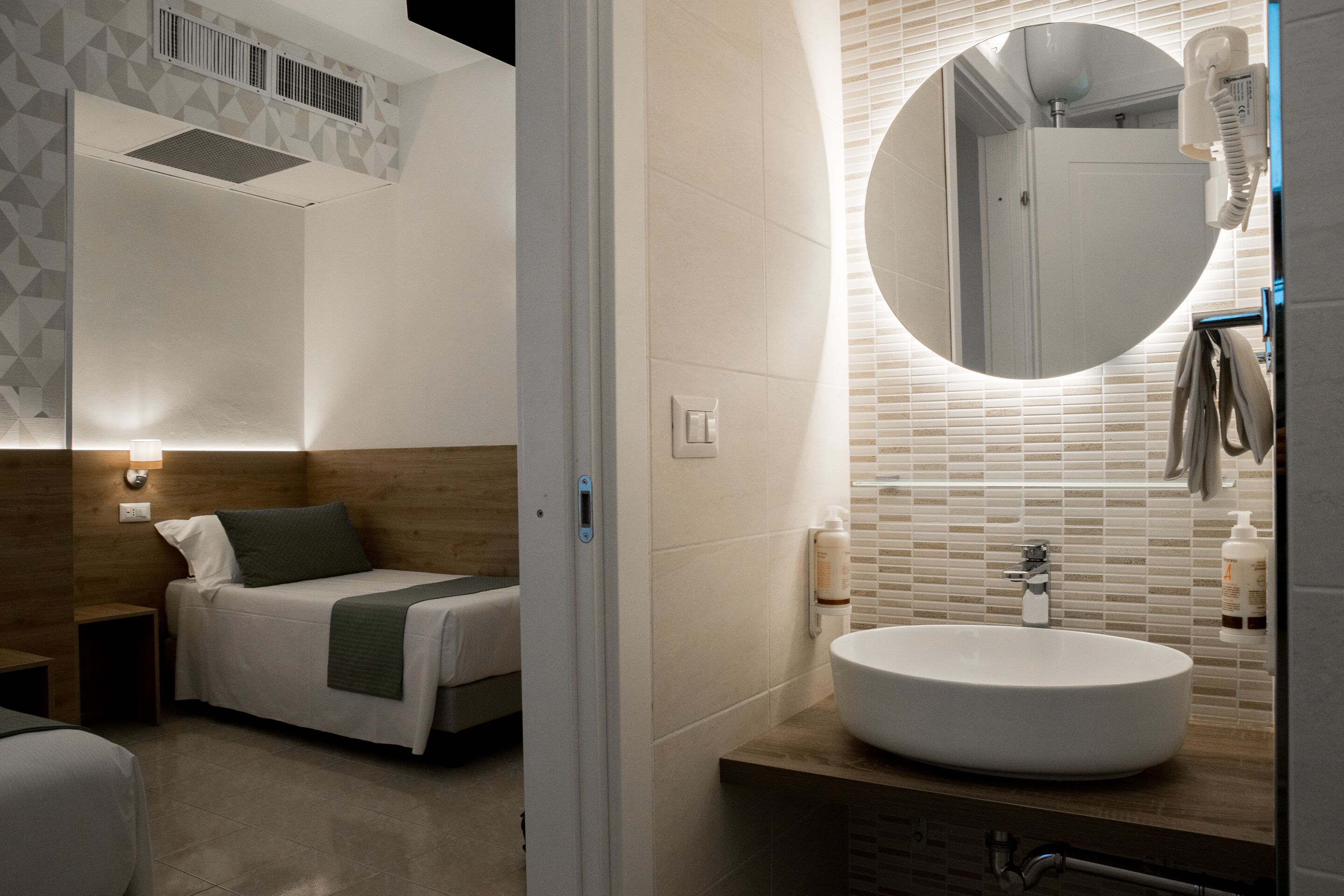 superior triple room | bathroom | shower, rainfall showerhead, free toiletries, hair dryer