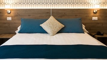 Quarto casal superior | 1 quarto, roupas de cama premium, edredons de pluma, frigobar