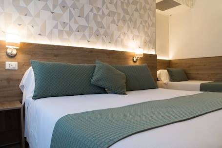 Superior Triple Room | Premium bedding, down comforters, minibar, desk. Hotel Pacific Roma
