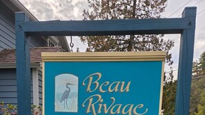 A sign for Beau Rivage with a number 2824. - Beau Rivage Waterfront, kayak, SUP, great fishing, swimming, fire pit, updated (Portlandville)