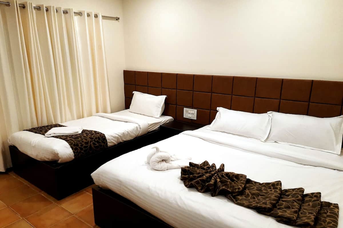 Kamar Quadruple Deluks | Seprai antialergi, tempat tidur lipat/tambahan, dan seprai linen