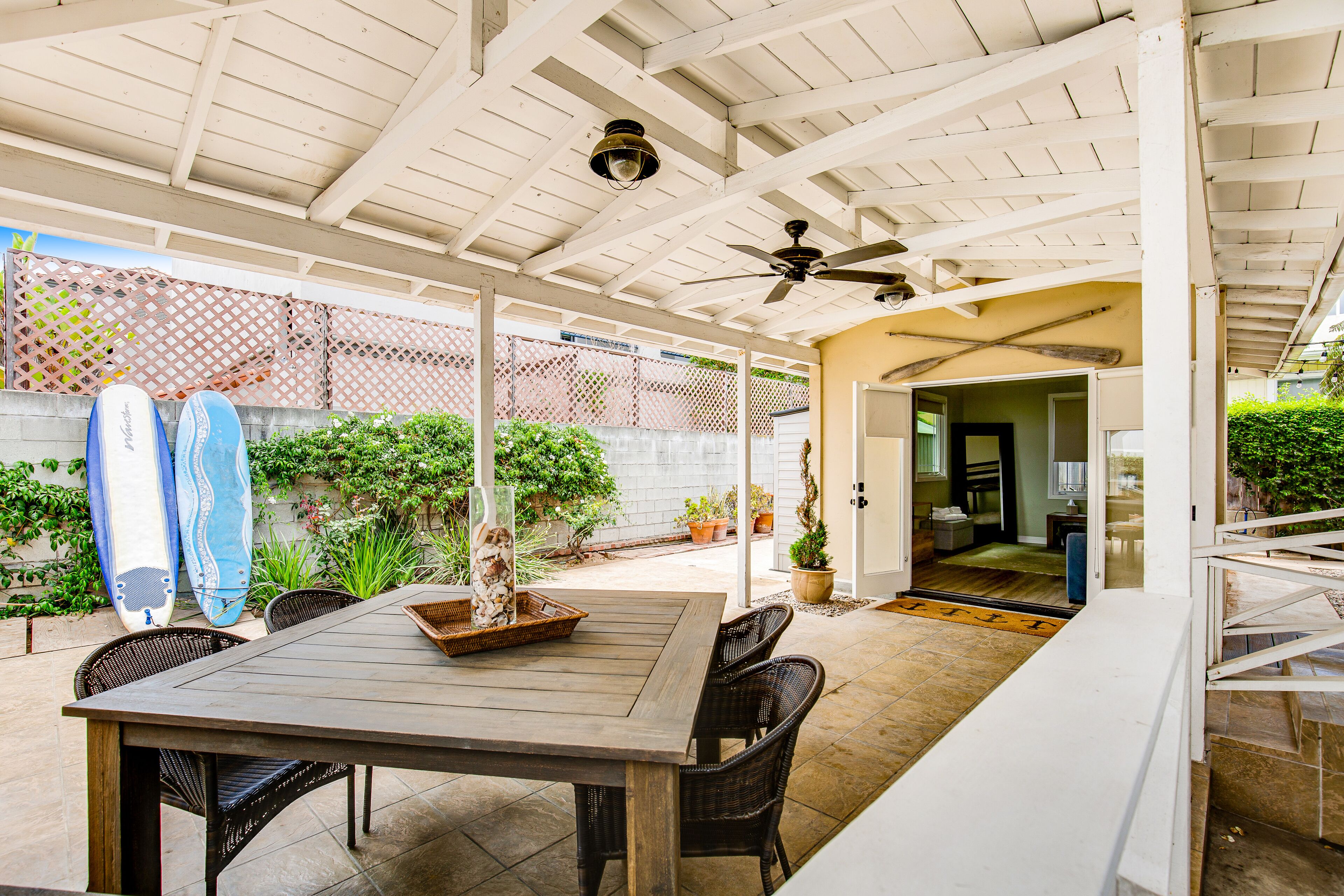 Dog-friendly house with beach access, firepit, deck, and enclosed yard