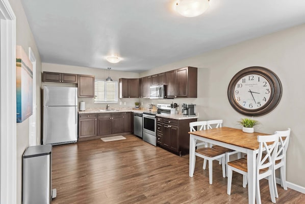 Coffee/tea maker, fridge, microwave, oven