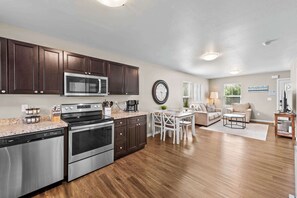 Coffee/tea maker, fridge, microwave, oven
