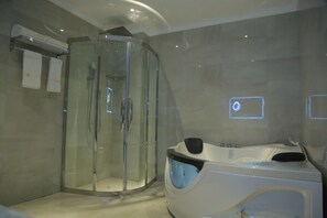 Executive Room | Bathroom | Combined shower/bathtub, deep-soaking bathtub, rainfall showerhead - Check inn hotel (Addis Ababa)