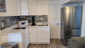 Fridge, microwave, coffee/tea maker, toaster