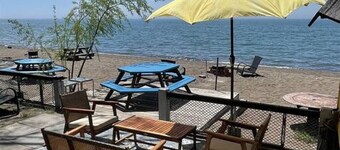 The Green Jelly Bean · Lakefront Tiny Home Cabin on the Beach