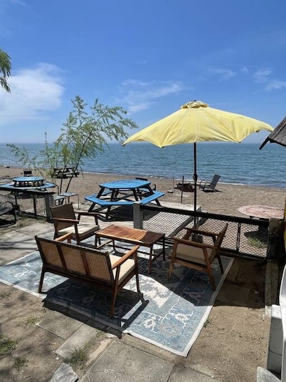 The Green Jelly Bean · Lakefront Tiny Home Cabin on the Beach